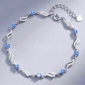 Delicate Sterling Silver Bracelet with Light Blue Crystals